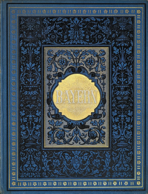Ein blau-goldenes Buch mit der Aufschrift "Bayern" auf dem kunstvoll gestalteten Cover.