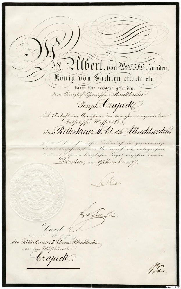 Altes Dokument mit schwarzem Rand und weißem Hintergrund, Text lautet "Ritterkreuz II, dresden, deutschland", zeigt Logo der deutschen Regierung.